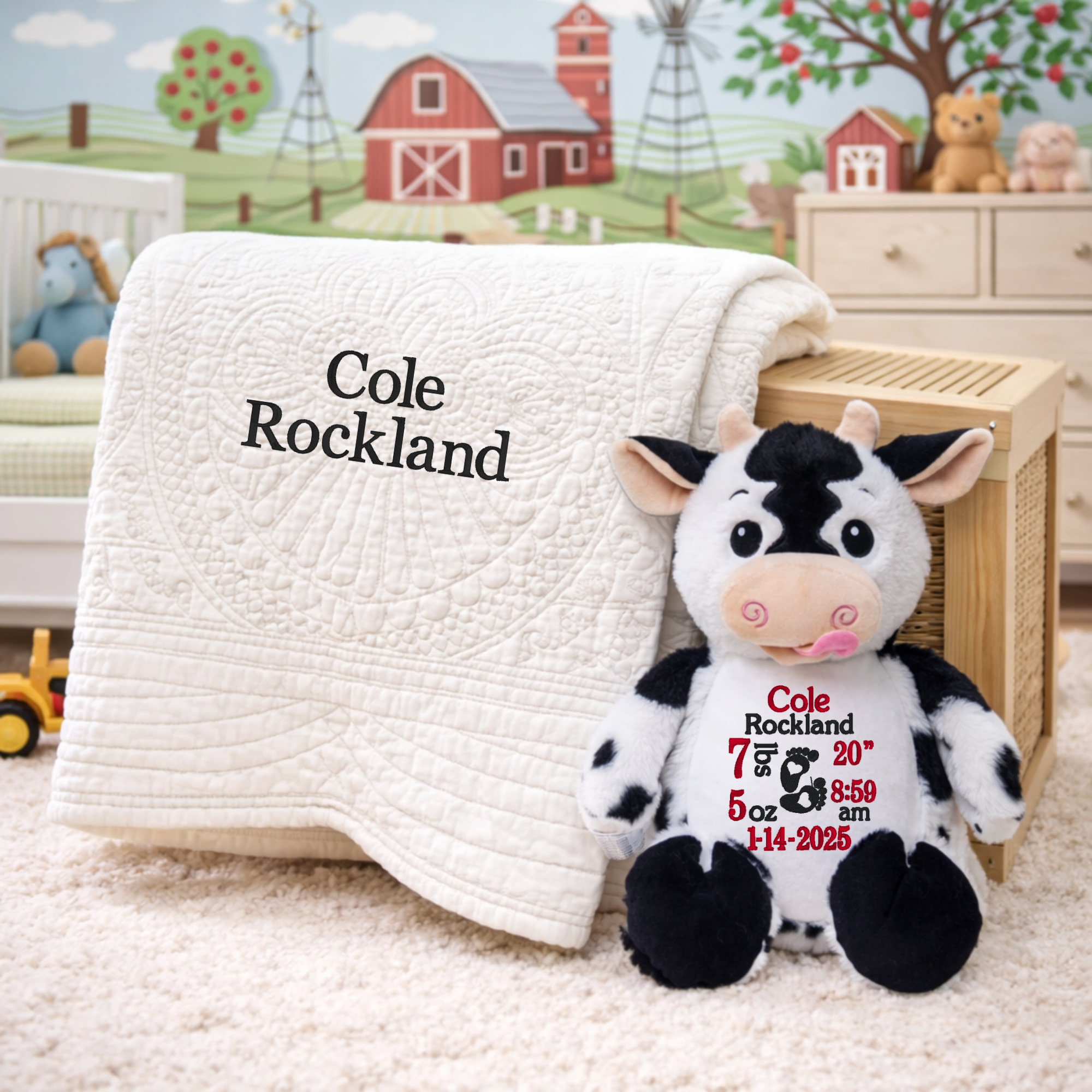 embroidered blanket and stuffed animal